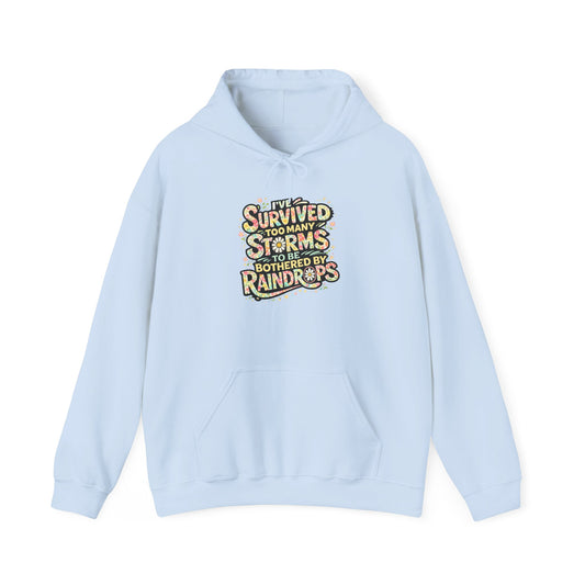 Hoodie — "I Survived Too Many Storms to Be Bothered by Raindrops" Retro Graphic